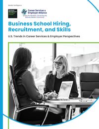 Woman with glasses converses with another women working on a laptop with the text, "Business School Hiring, Recruitment, and Skills"